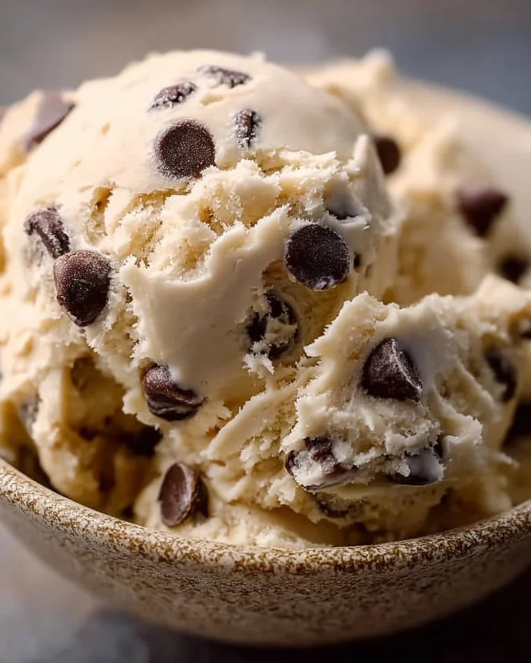 Bowl of Greek Yogurt Cookie Dough with chocolate chips and fresh ingredients