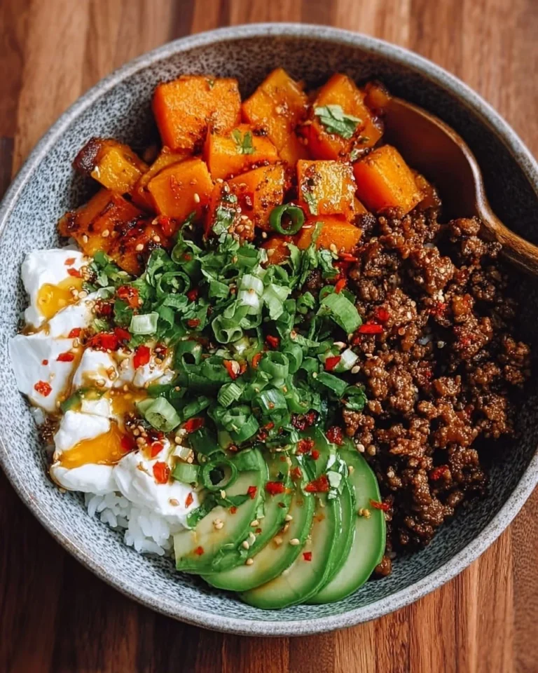Viral ground beef hot honey bowl topped with fresh ingredients.