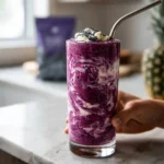 Nutrient-dense breakfast smoothie with superfoods in a glass